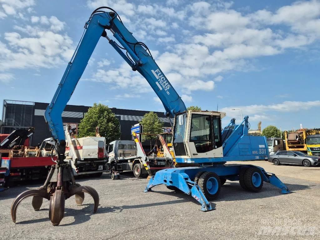 Fuchs MHL 331 Paleta de manipulare