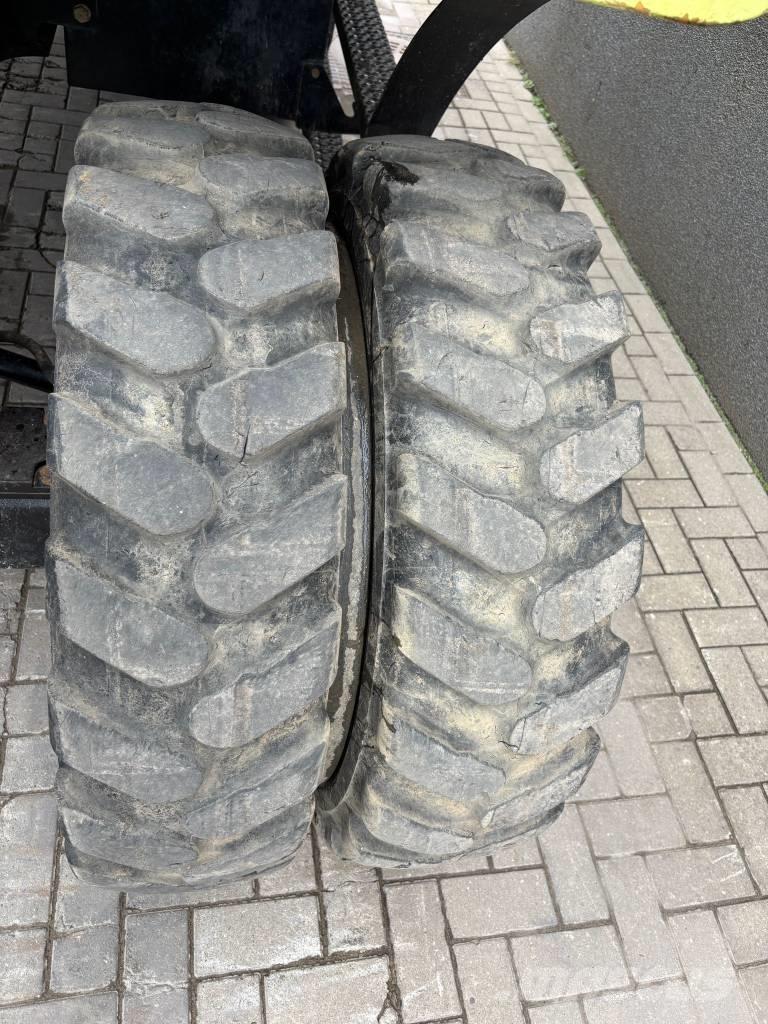 CAT M 320 F Excavatoare cu roti