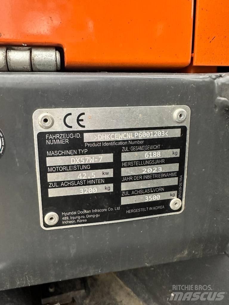 Develon DX 57 W-7 Excavatoare cu roti