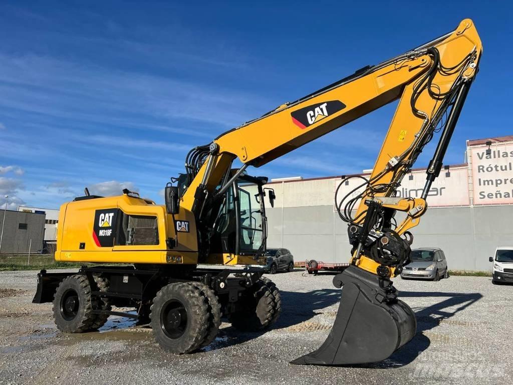 CAT M 318 F Excavatoare cu roti