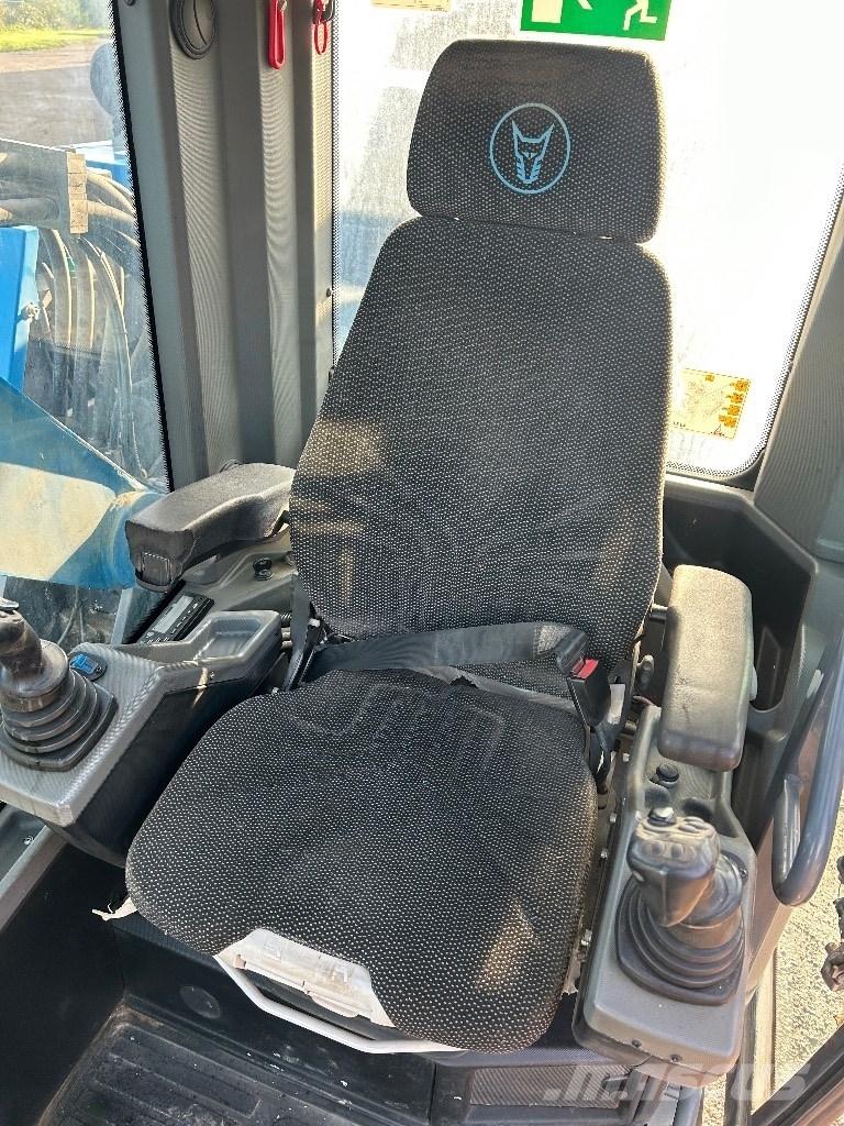 Fuchs MHL 320 T4F Paleta de manipulare
