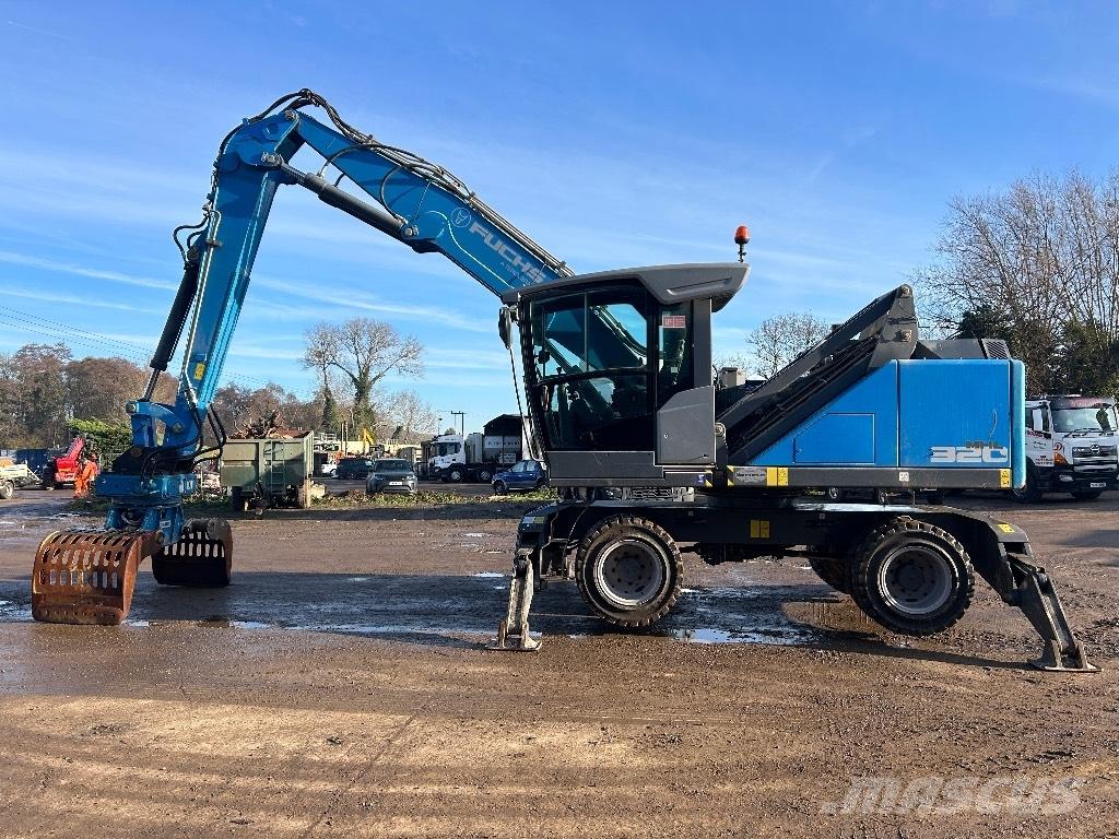 Fuchs MHL 320 T4F Paleta de manipulare