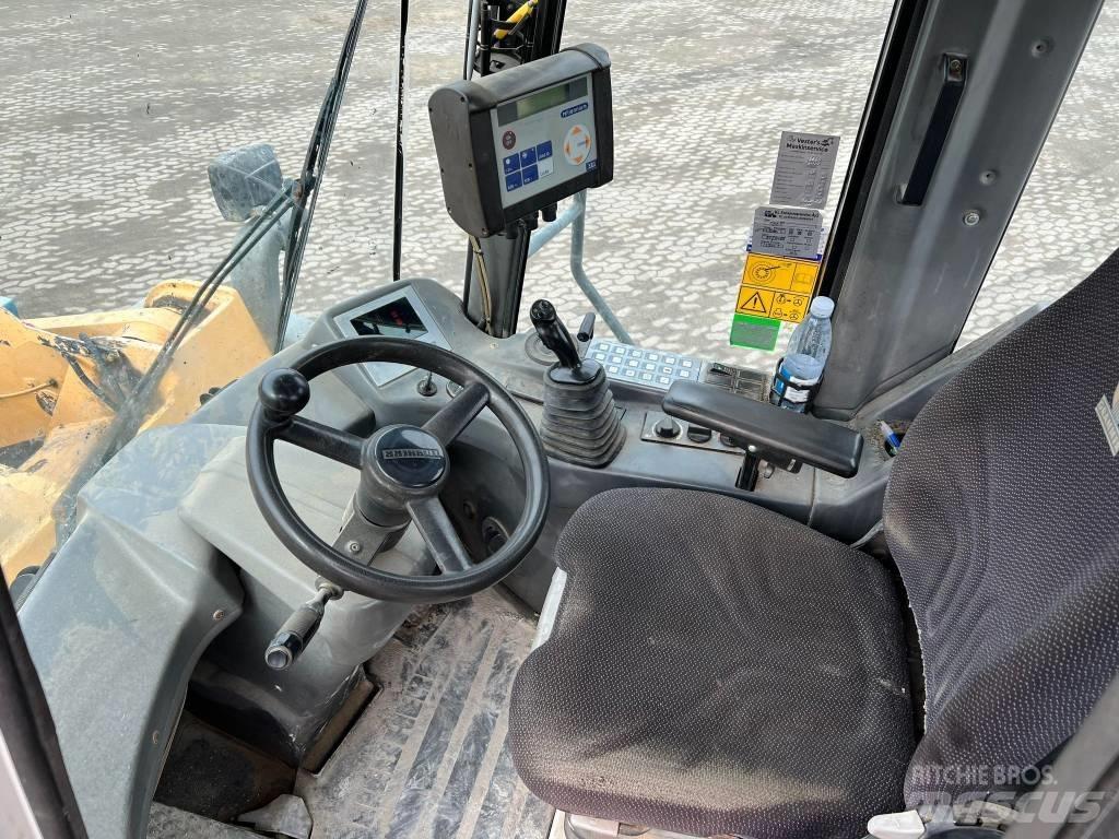 Liebherr 580 Incarcator pe pneuri