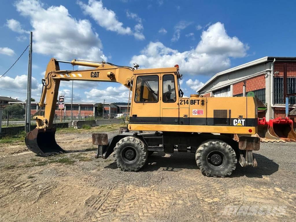 CAT 214 Excavatoare cu roti