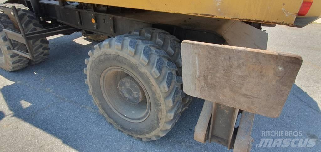 CAT 214 B Excavatoare cu roti