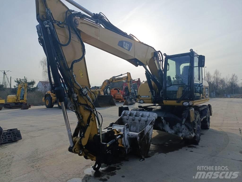 CAT M 313 D Excavatoare cu roti