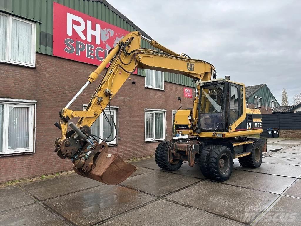 CAT M315 +ROTO CE Excavatoare cu roti