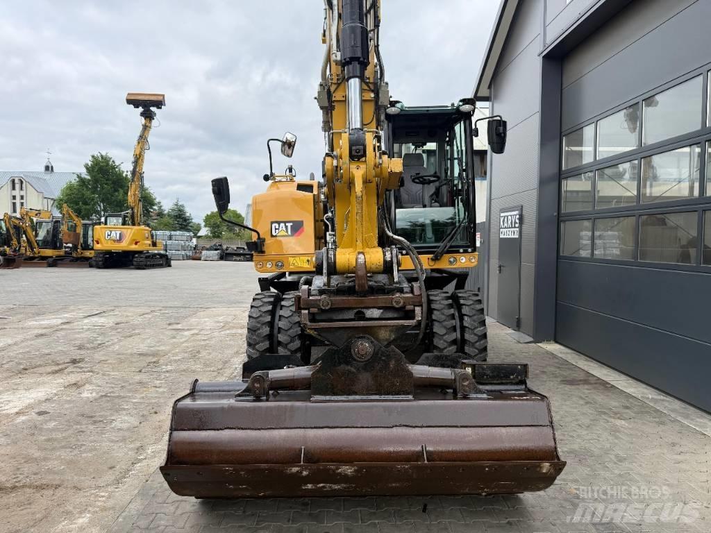 CAT M 318 F Excavatoare cu roti