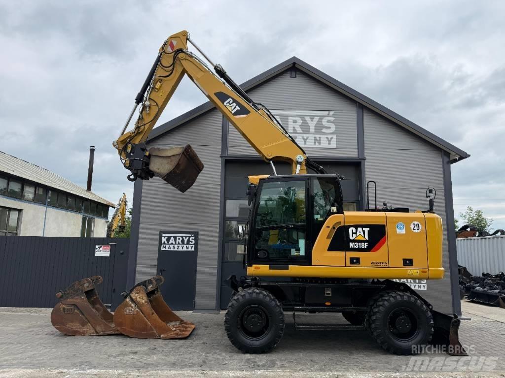 CAT M 318 F Excavatoare cu roti