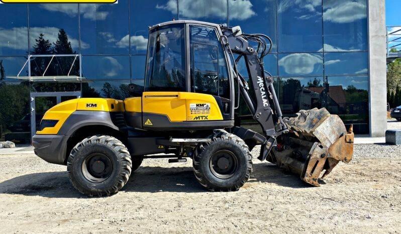 Mecalac 12 M TX Buldoexcavatoare
