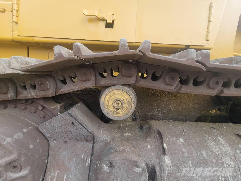 CAT 973 Încarcatoare cu excavator