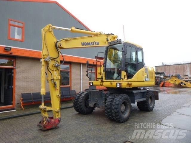 Komatsu PW 140-7 Excavatoare cu roti