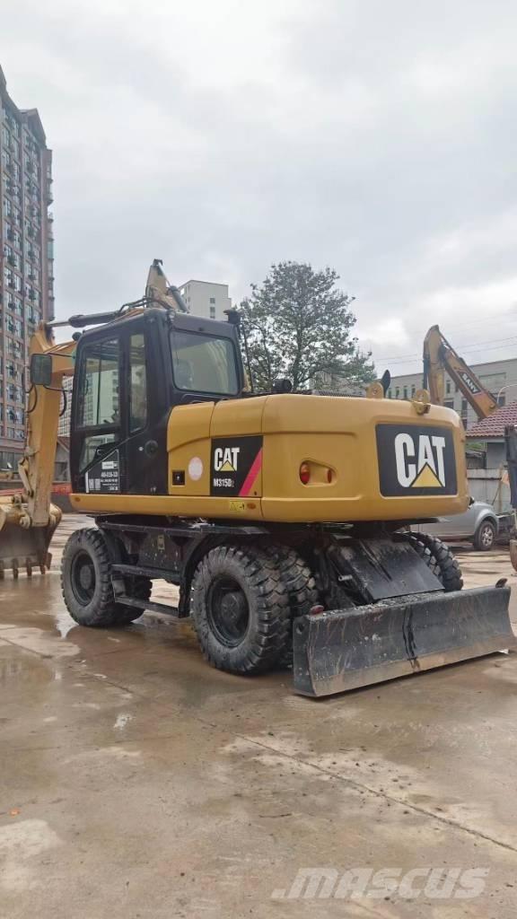 CAT M 315 D Excavatoare cu roti