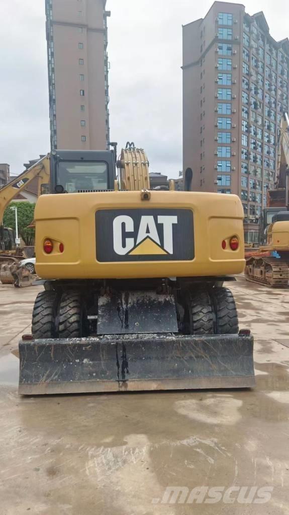 CAT M 315 D Excavatoare cu roti