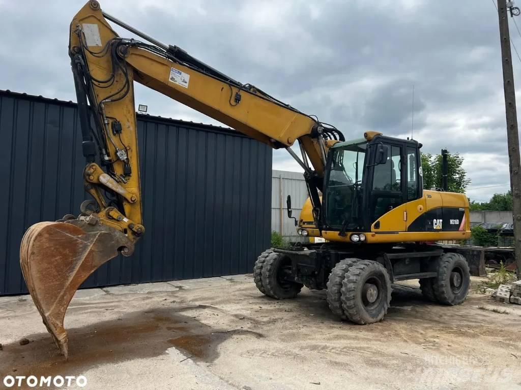 CAT M 316 D Excavatoare cu roti
