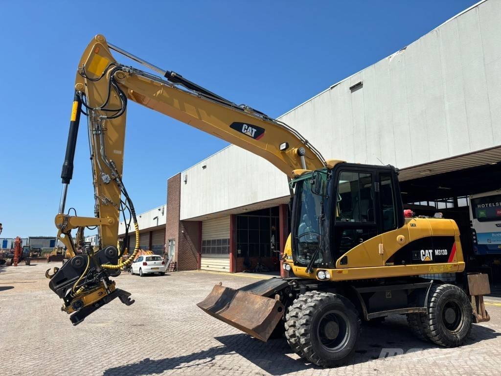 CAT M 313 D Excavatoare cu roti