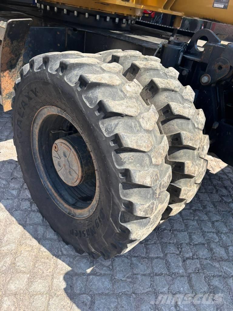 CAT M 313 D Excavatoare cu roti