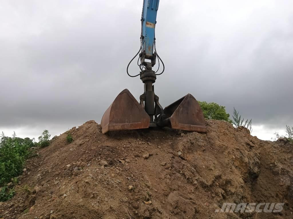 Fuchs MHL 360 Paleta de manipulare
