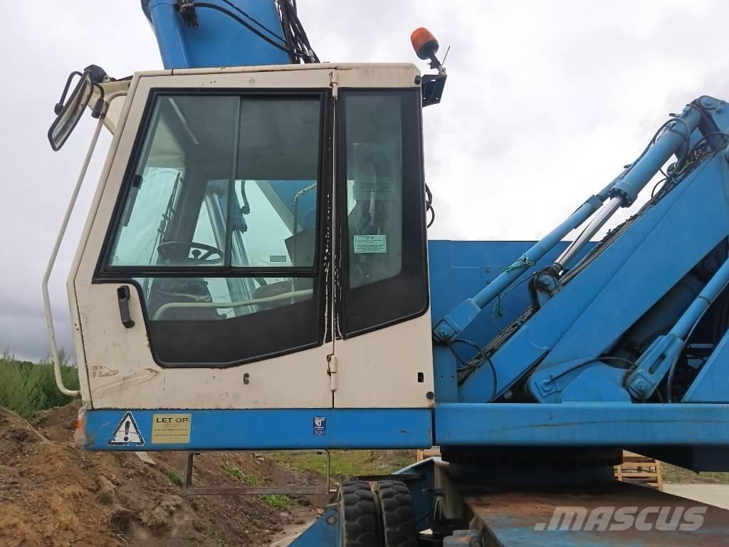 Fuchs MHL 360 Paleta de manipulare