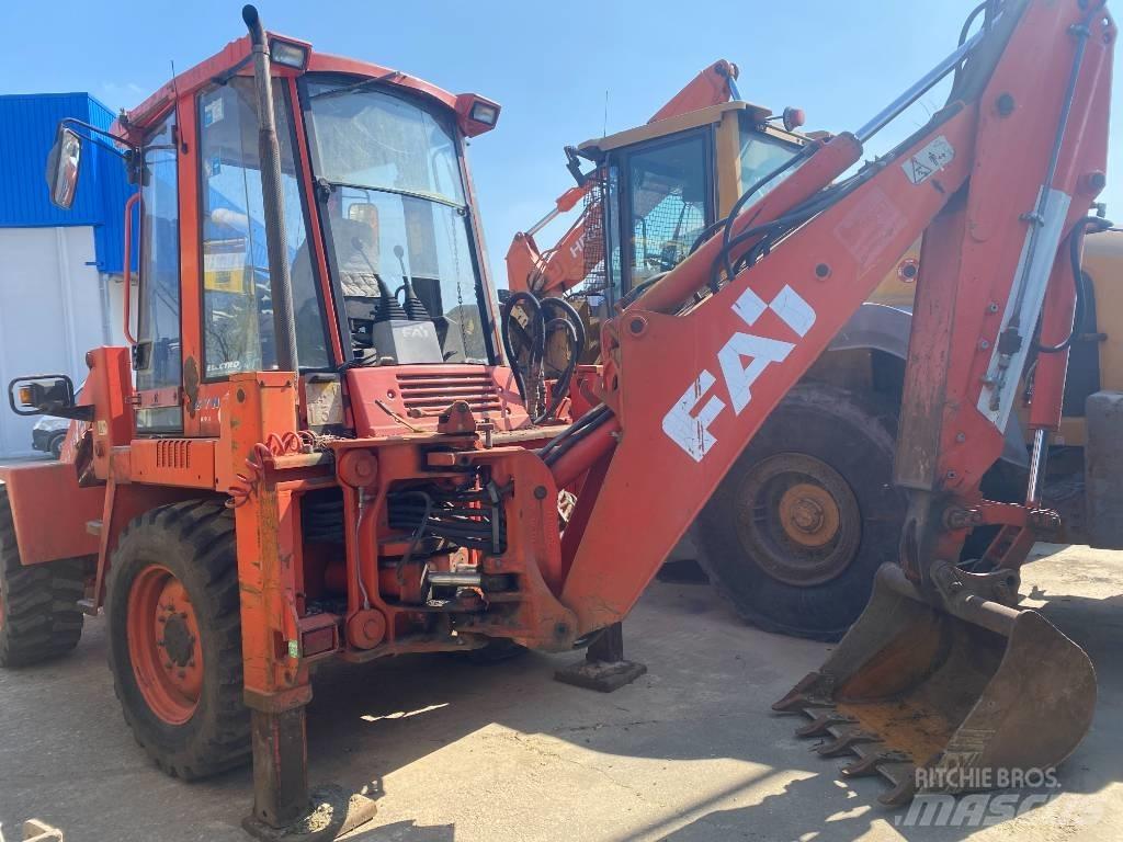 Fai KOMATSU 595s Buldoexcavatoare