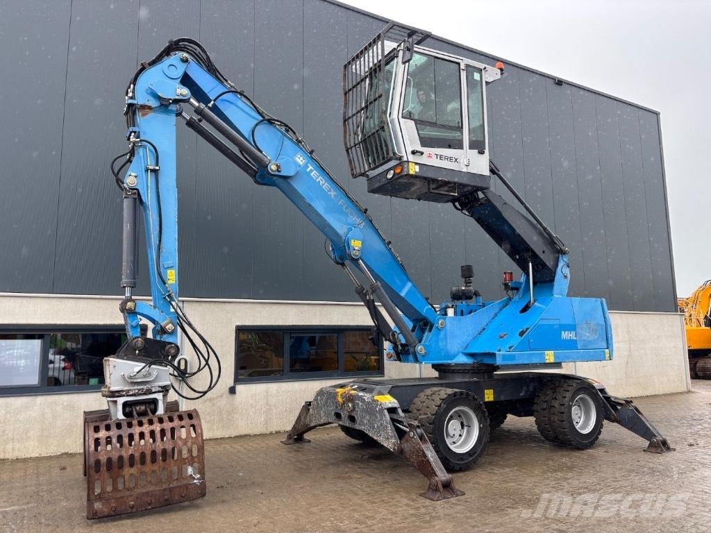 Fuchs MHL 320 D Paleta de manipulare