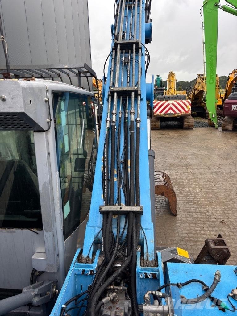 Fuchs MHL 320 D Paleta de manipulare