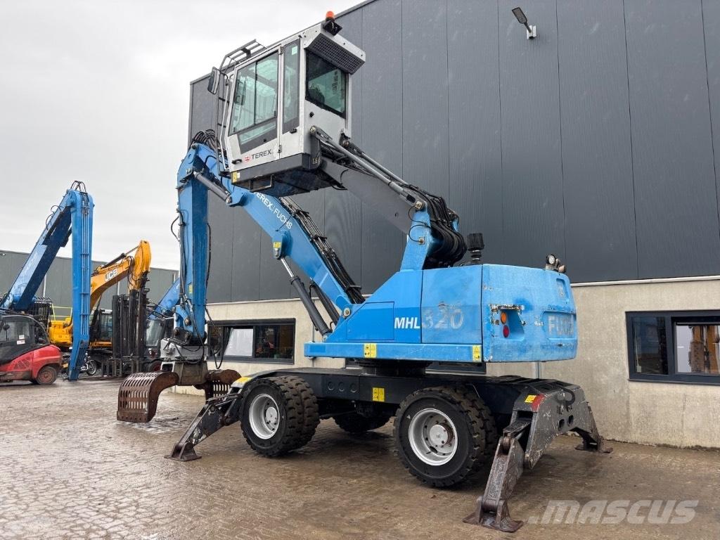 Fuchs MHL 320 D Paleta de manipulare
