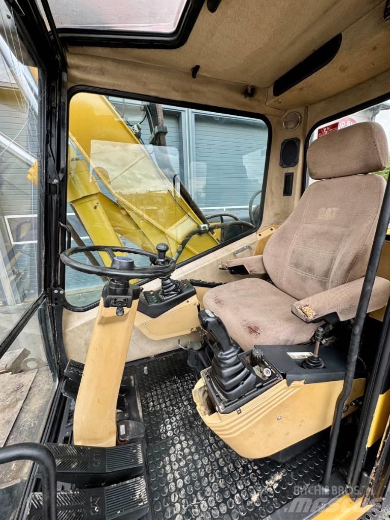 CAT M 315 Excavatoare cu roti