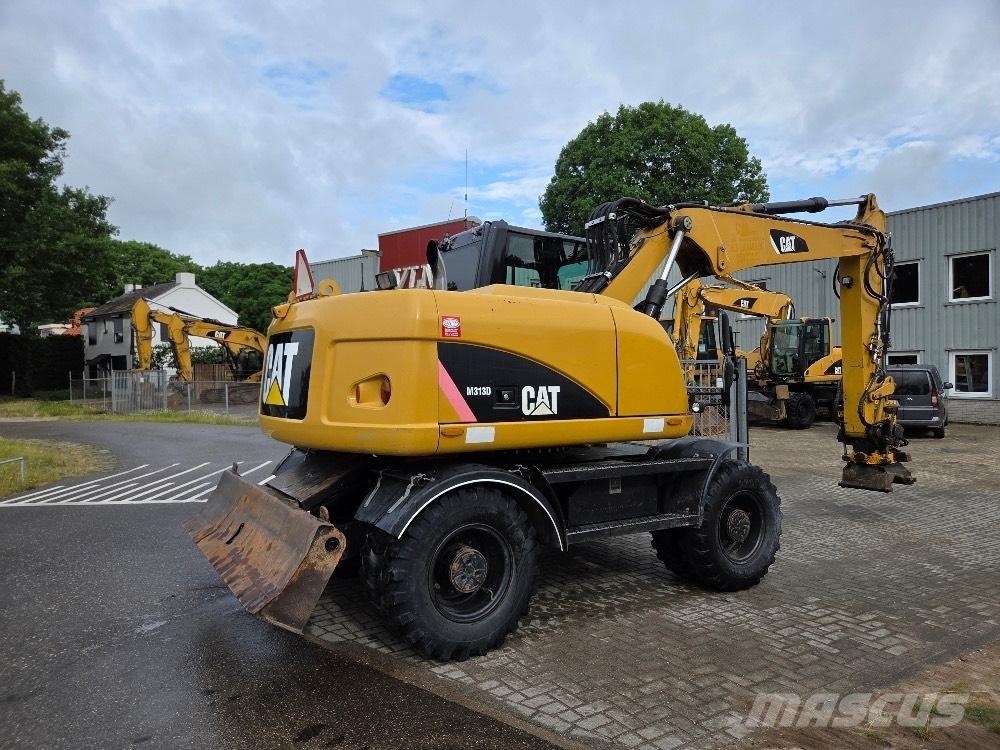 CAT M313D Excavatoare cu roti