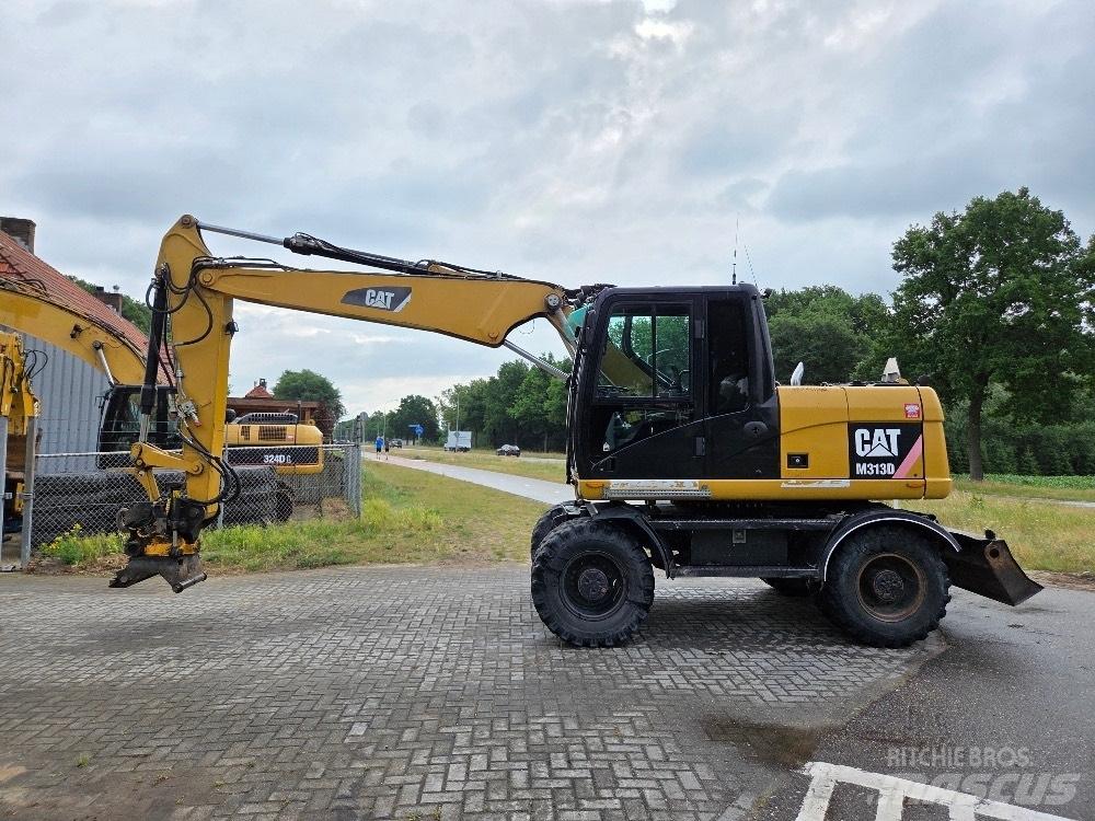 CAT M313D Excavatoare cu roti