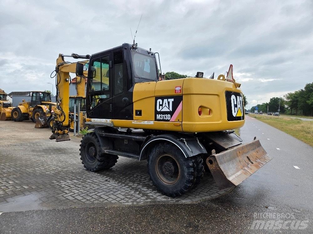 CAT M313D Excavatoare cu roti