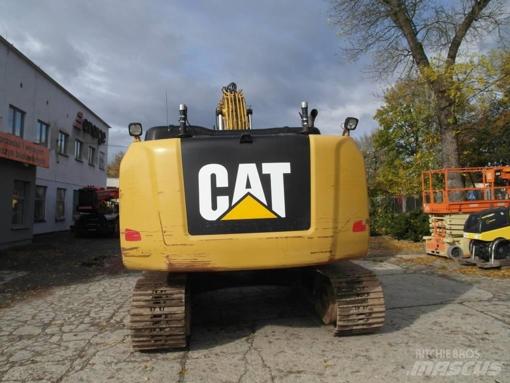 CAT 323 EL Excavatoare pe șenile
