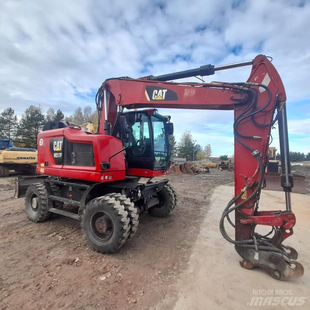 CAT M317 Excavatoare cu roti