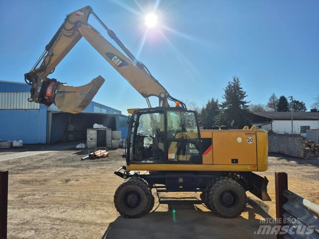 CAT M322F Excavatoare cu roti