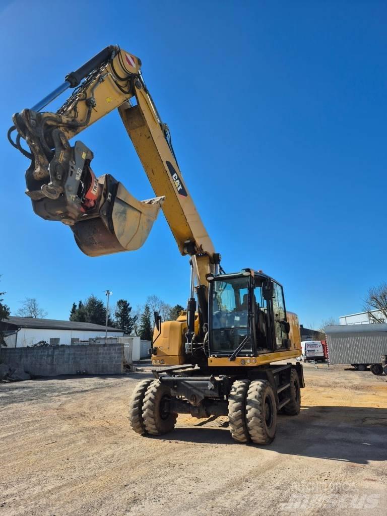 CAT M322F Excavatoare cu roti