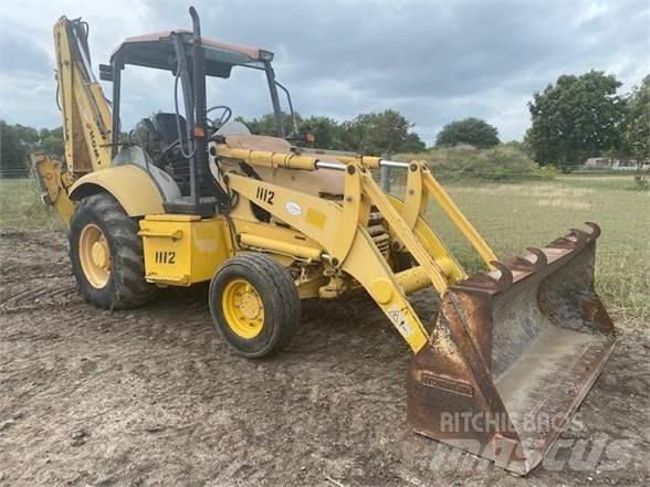 Komatsu WB140 Buldoexcavatoare