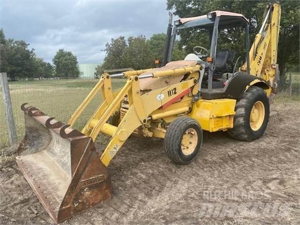 Komatsu WB140 Buldoexcavatoare