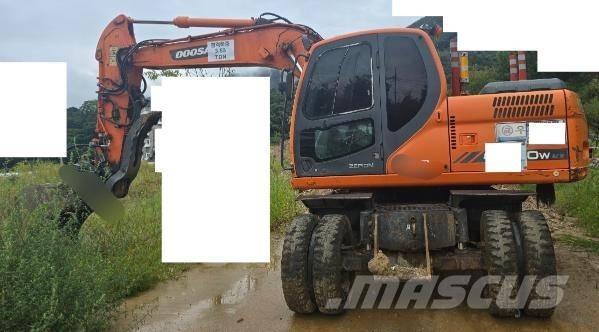 Doosan DX 140 W Excavatoare cu roti