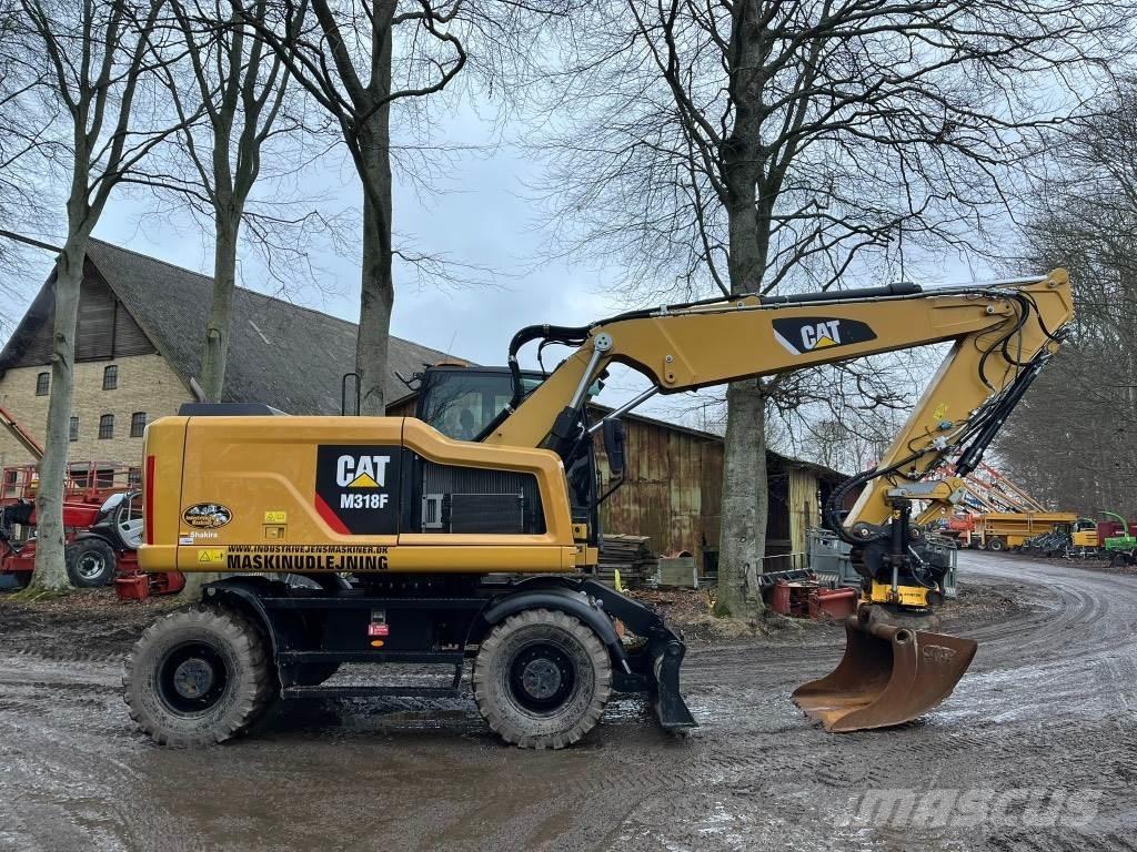 CAT M 318 F Excavatoare cu roti