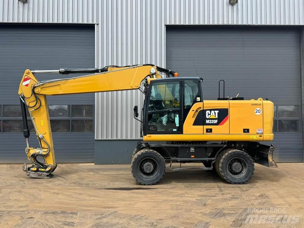 CAT M320F Excavatoare cu roti