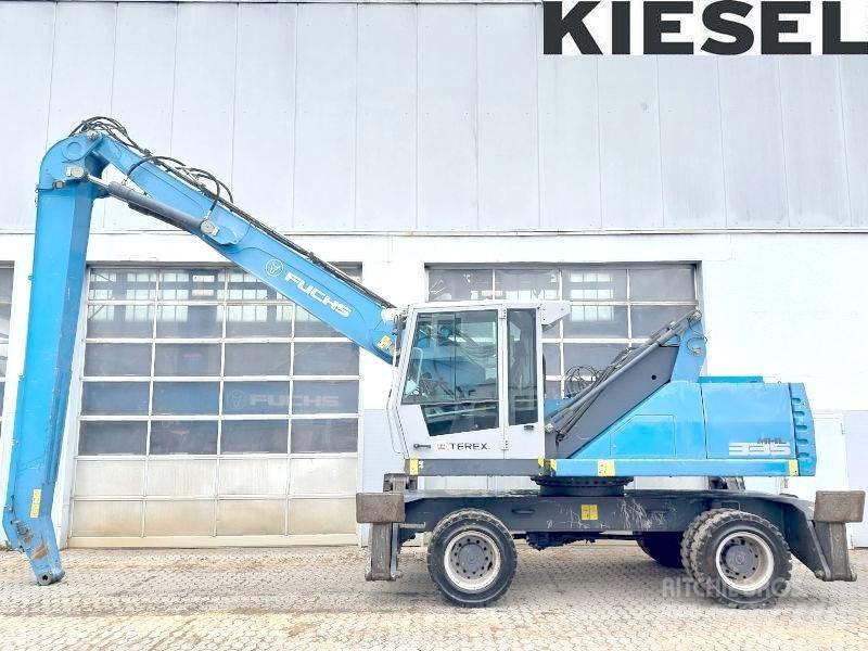 Fuchs MHL 335 E Paleta de manipulare