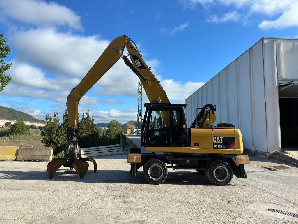 CAT M 318 MH Excavatoare cu roti