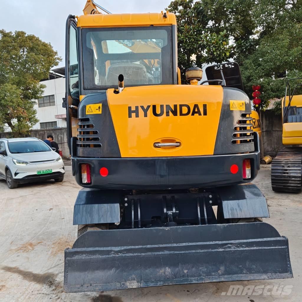 Hyundai 60 W VS Excavatoare cu roti