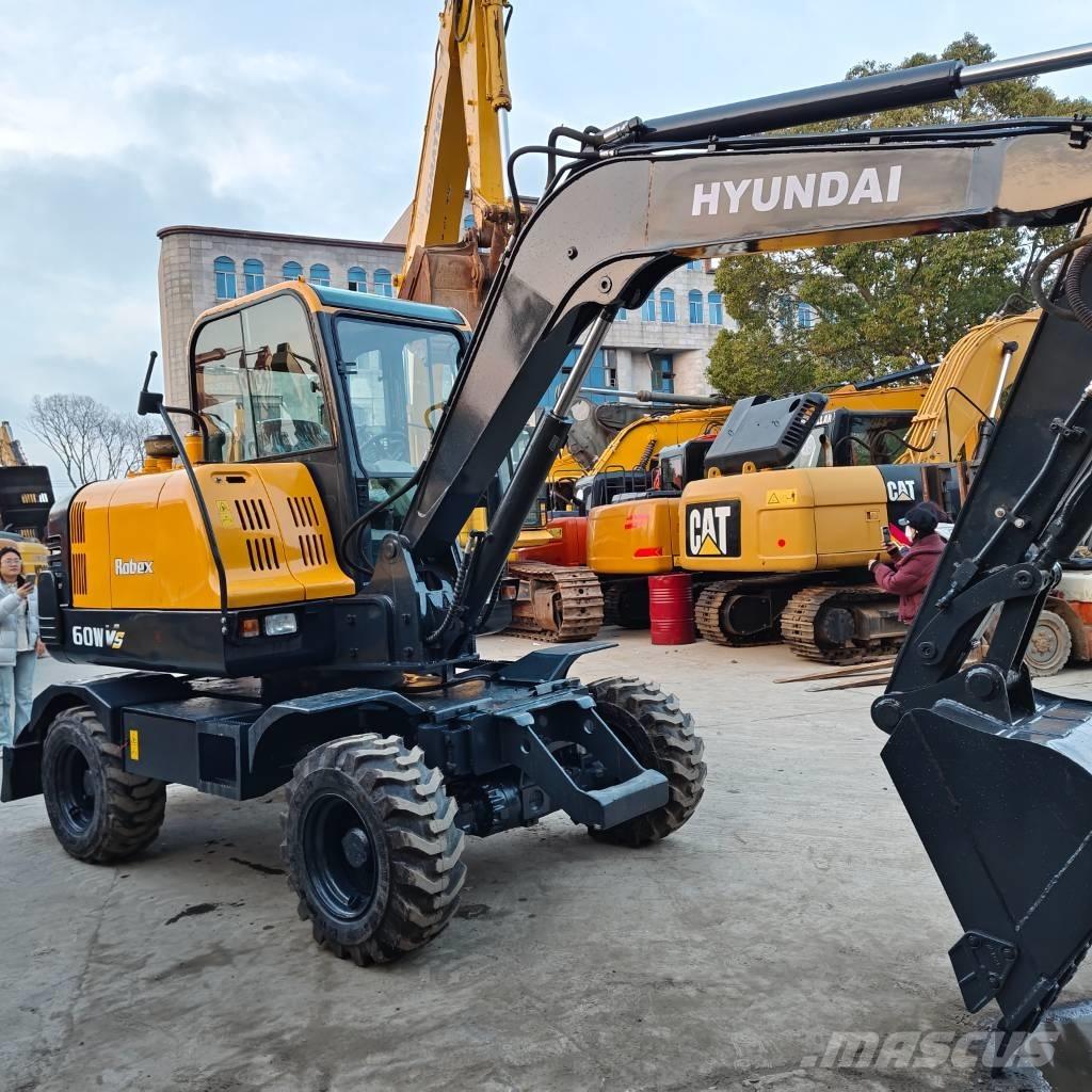 Hyundai 60 W VS Excavatoare cu roti