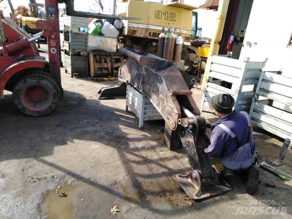 CAT M 318 Sasiuri si suspensii