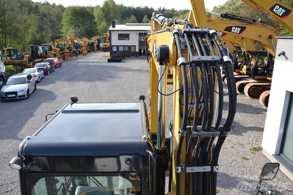 CAT M 315 D Excavatoare cu roti