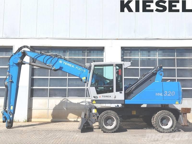 Fuchs MHL 320 D Paleta de manipulare