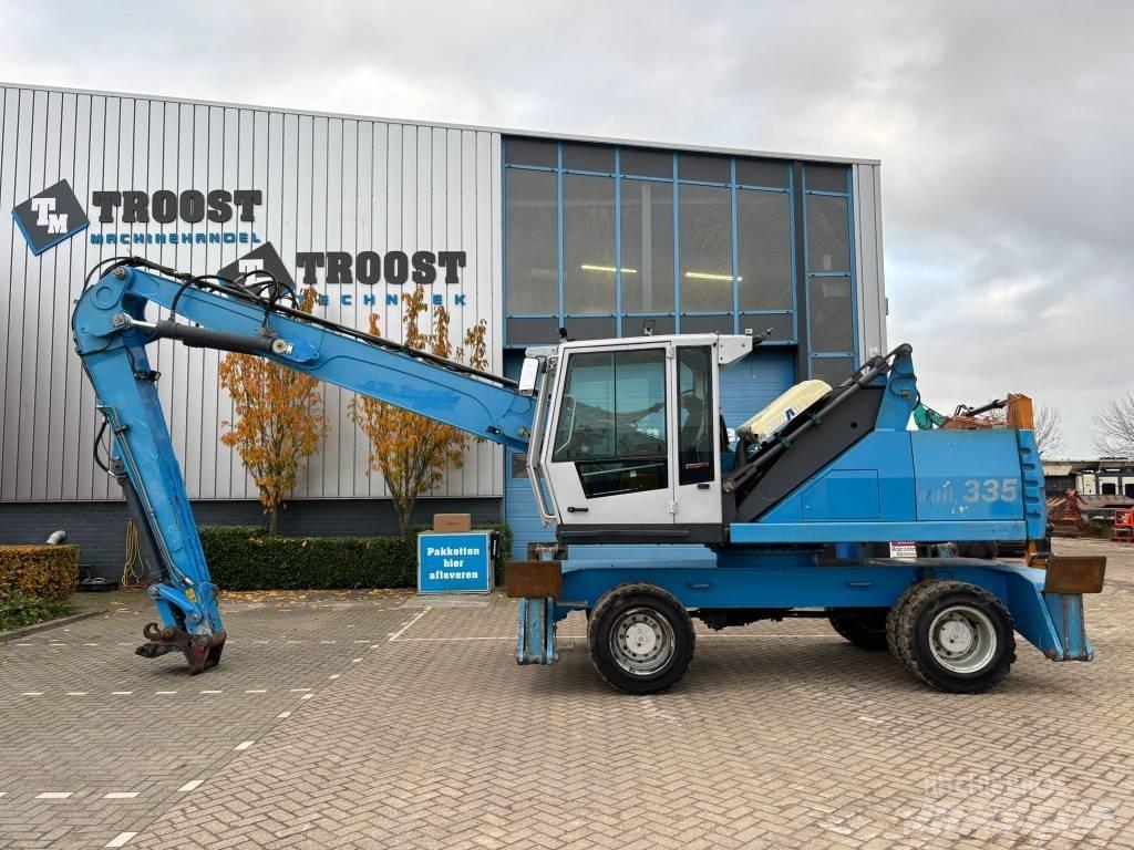 Fuchs MHL 335 Paleta de manipulare