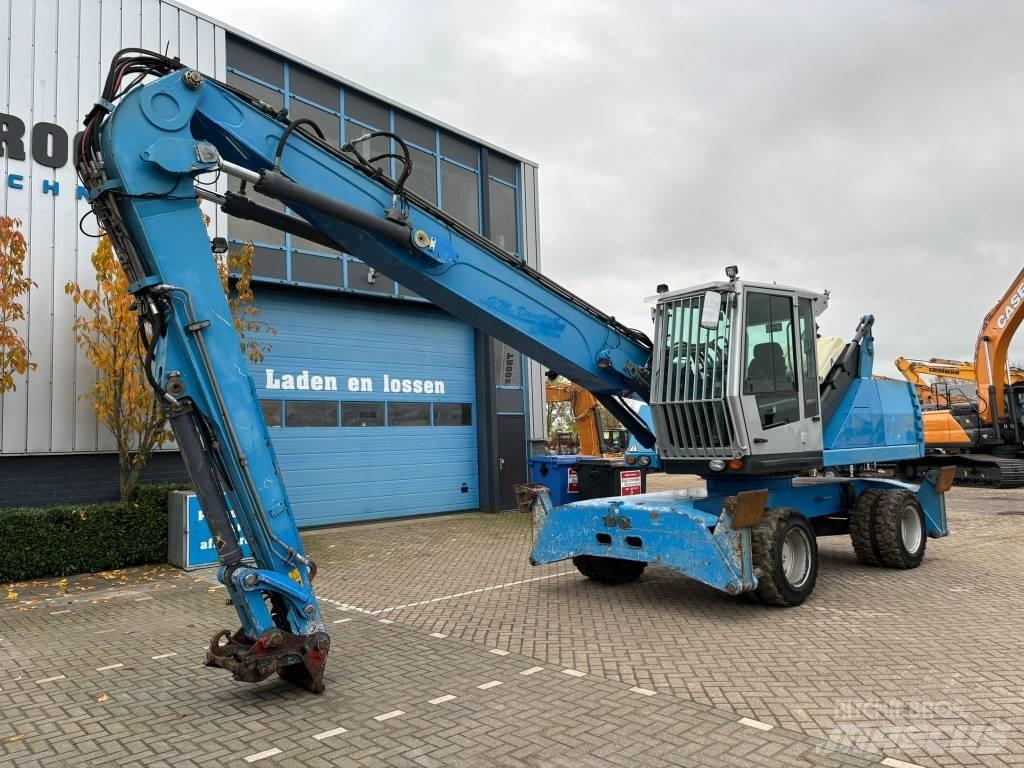 Fuchs MHL 335 Paleta de manipulare