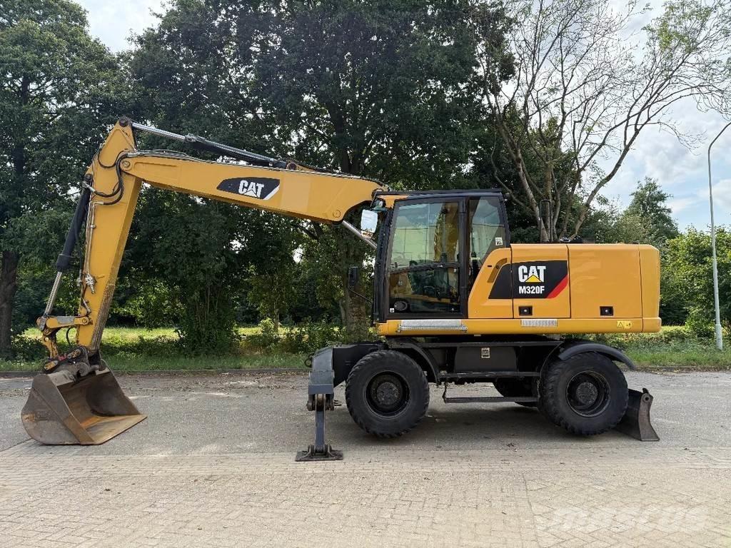 CAT M320F Excavatoare cu roti